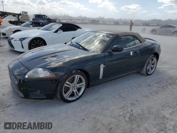 2007 Jaguar XK with VIN SAJWA44C779B12243, listed as a Copart auction lot 77239534 with Not Provided miles and Salvage Title. Bid and sale history available at carsss.com. Image 1.