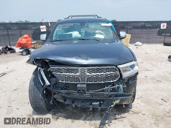 2014 Dodge Durango SXT with VIN 1C4RDHAG3EC560851, listed as a IAAI auction lot 42282572 with Not provided miles and . Bid and sale history available at DreamBid. Image 13.