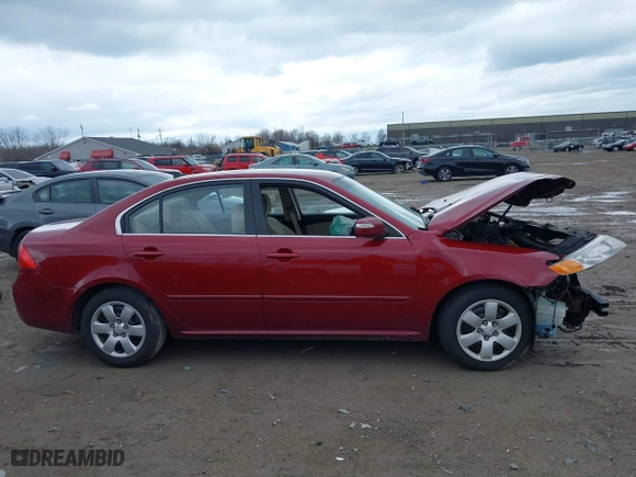 2009 Kia Optima LX with VIN KNAGE228295292892, listed as a IAAI auction lot 41812221 with 179,276 mi miles. Bid and sale history available at carsss.com. Image 14.