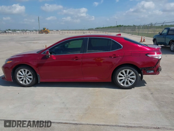 2020 Toyota Camry LE with VIN 4T1L11AK3LU993342, listed as a IAAI auction lot 42033420 with 84,849 mi miles and . Bid and sale history available at DreamBid. Image 14.