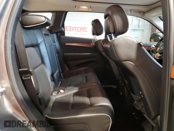 2013 Jeep Grand Cherokee Overland with VIN 1C4RJFCT5DC599866, listed as a Copart auction lot 51837395 with 105,521 mi miles and Salvage Title. Bid and sale history available at carsss.com. Image 10.