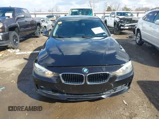 2015 BMW 3 Series 328i xDrive with VIN WBA3B5G56FNS20581, listed as a IAAI auction lot 41692014 with 196,609 mi miles. Bid and sale history available at carsss.com. Image 12.