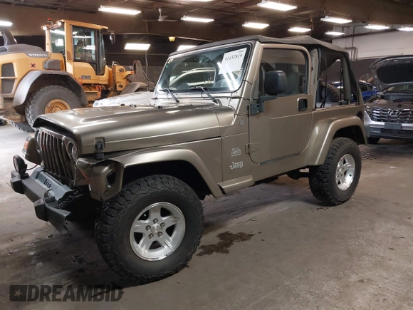 2004 Jeep Wrangler Sahara with VIN 1J4FA59S64P736389, listed as a IAAI auction lot 41432819 with 102,830 mi miles and . Bid and sale history available at DreamBid. Image 17.