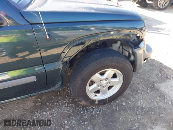 2005 Jeep Liberty Sport with VIN 1J4GL48K05W584675, listed as a IAAI auction lot 41867491 with 112,882 mi miles. Bid and sale history available at carsss.com. Image 17.