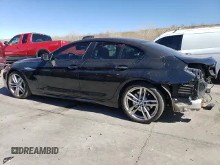 2015 BMW 6 Series 650i xDrive with VIN WBA6B4C55FD761124, listed as a Copart auction lot 50559555 with 49,735 mi miles and Salvage Title. Bid and sale history available at DreamBid. Image 2.