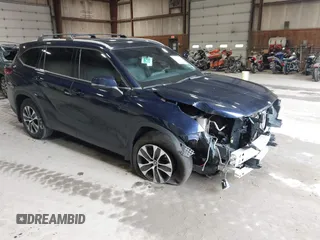 2022 Toyota Highlander XLE with VIN 5TDHZRBH7NS573045, listed as a IAAI auction lot 42457896 with 74,724 mi miles and . Bid and sale history available at DreamBid. Image 1.