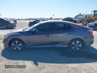 2019 Honda Civic Sedan LX with VIN 19XFC2F64KE005270, listed as a IAAI auction lot 41852238 with 106,604 mi miles. Bid and sale history available at carsss.com. Image 14.