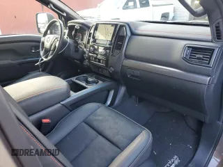 2022 Nissan Titan XD Platinum Reserve with VIN 1N6AA1FB9NN104042, listed as a Copart auction lot 75653184 with 28,709 mi miles and Salvage Title. Bid and sale history available at carsss.com. Image 12.
