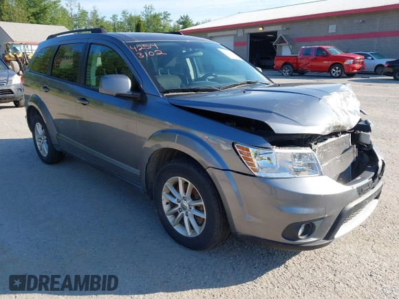 2013 Dodge Journey SXT with VIN 3C4PDDBGXDT607052, listed as a IAAI auction lot 42543102 with 157,325 mi miles and . Bid and sale history available at DreamBid. Image 1.