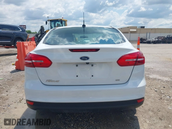 2016 Ford Focus SE z VIN 1FADP3F29GL346196, wystawiony jako IAAI lot #42171014 z przebiegiem 80 913 mil mil oraz . Historia ofert i sprzedaży dostępna na DreamBid. Obrazek 16.