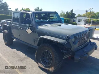 2021 Jeep Gladiator 80th Anniversary с VIN 1C6HJTAG7ML564981, выставлен на аукционе IAAI как лот 42455062 с пробегом 89 721 миль миль и . История ставок и продаж доступна на DreamBid. Изображение 1.