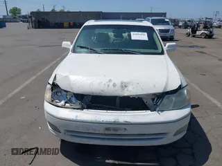 2001 Toyota Avalon XL z VIN 4T1BF28B51U168456, wystawiony jako IAAI lot #42093996 z przebiegiem 276 229 mil mil oraz . Historia ofert i sprzedaży dostępna na DreamBid. Obrazek 12.