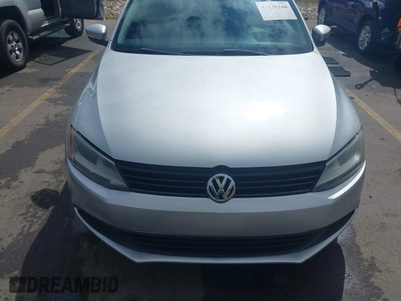 2011 Volkswagen Jetta SE z VIN 3VWDZ7AJ7BM340220, wystawiony jako IAAI lot #42136168 z przebiegiem 147 864 mil mil oraz . Historia ofert i sprzedaży dostępna na DreamBid. Obrazek 13.