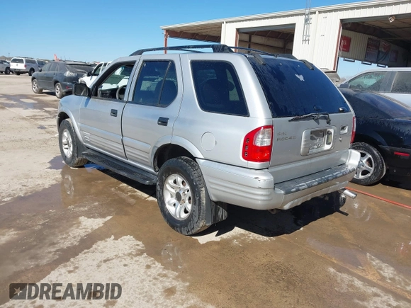 2002 Isuzu Rodeo S with VIN 4S2CK58WX24321556, listed as a IAAI auction lot 41405981 with 172,590 mi miles and . Bid and sale history available at DreamBid. Image 3.