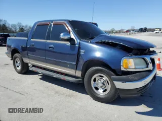 2003 Ford F-150 XLT with VIN 1FTRW07633KD25329, listed as a Copart auction lot 49438145 with 274,516 mi miles and Salvage Title. Bid and sale history available at carsss.com. Image 4.