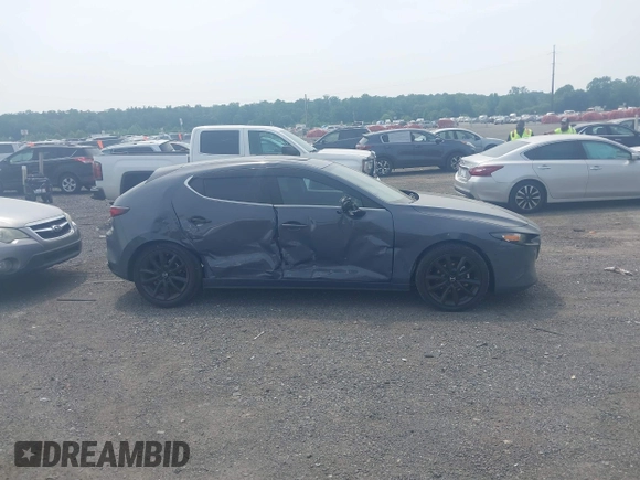 2023 Mazda 3 S Preferred with VIN JM1BPALM7P1600527, listed as a IAAI auction lot 42442039 with 58,232 mi miles and . Bid and sale history available at DreamBid. Image 13.