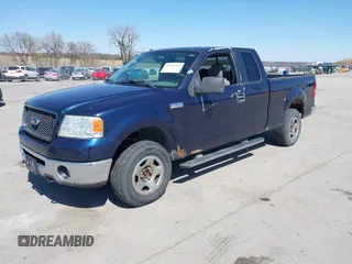 2006 Ford F-150 XLT with VIN 1FTPX14506NA41570, listed as a IAAI auction lot 41963266 with 151,380 mi miles. Bid and sale history available at carsss.com. Image 2.