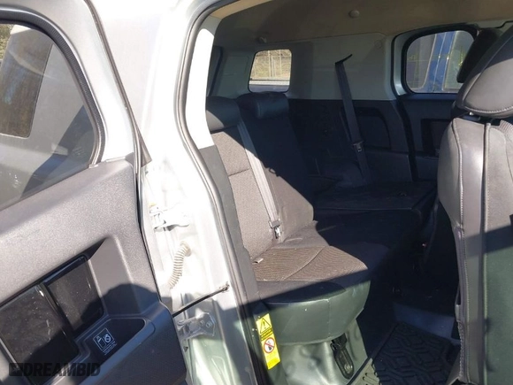 2008 Toyota FJ Cruiser with VIN JTEBU11F78K053070, listed as a IAAI auction lot 40687990 with 155,084 mi miles. Bid and sale history available at carsss.com. Image 8.