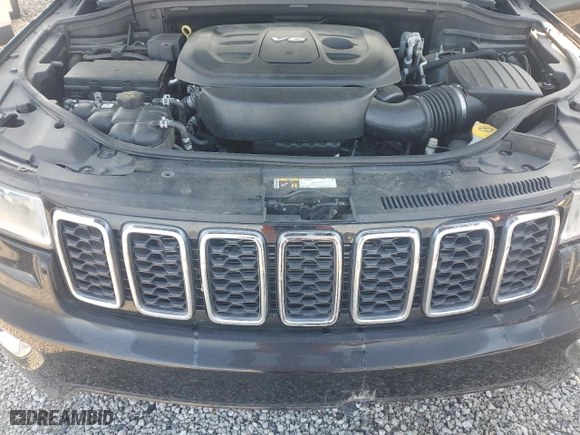 2017 Jeep Grand Cherokee Laredo with VIN 1C4RJEAG0HC647750, listed as a Copart auction lot 52619875 with 105,464 mi miles and Salvage Title. Bid and sale history available at carsss.com. Image 12.