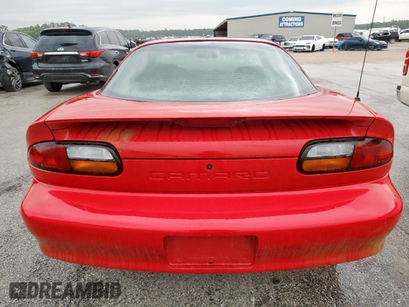 2002 Chevrolet Camaro z VIN 2G1FP22K322135404, wystawiony jako Copart lot #58767305 z przebiegiem Nie podano mil oraz Czysty tytuł • Clean title. Historia ofert i sprzedaży dostępna na DreamBid. Obrazek 6.