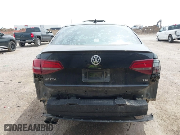 2016 Volkswagen Jetta Sport z VIN 3VWD17AJ0GM409795, wystawiony jako IAAI lot #41773028 z przebiegiem 147 979 mil mil oraz . Historia ofert i sprzedaży dostępna na DreamBid. Obrazek 16.
