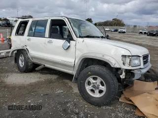 1999 Isuzu Trooper S z VIN JACDJ58XXX7922000, wystawiony jako Copart lot #48209835 z przebiegiem 127 024 mil mil oraz Szkoda całkowita • Salvage title. Historia ofert i sprzedaży dostępna na DreamBid. Obrazek 4.