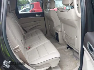 2017 Jeep Grand Cherokee Overland z VIN 1C4RJFCG7HC800403, wystawiony jako IAAI lot #42309664 z przebiegiem 98 389 mil mil oraz . Historia ofert i sprzedaży dostępna na DreamBid. Obrazek 8.