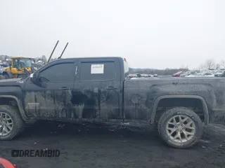 2018 GMC Sierra 1500 SLE z VIN 3GTU2MEC8JG249701, wystawiony jako IAAI lot #41556135 z przebiegiem 87 657 mil mil oraz . Historia ofert i sprzedaży dostępna na DreamBid. Obrazek 14.