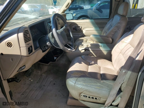 1999 GMC Suburban with VIN 3GKEC16R7XG542862, listed as a Copart auction lot 77568734 with 251,717 mi miles and Salvage Title. Bid and sale history available at carsss.com. Image 7.