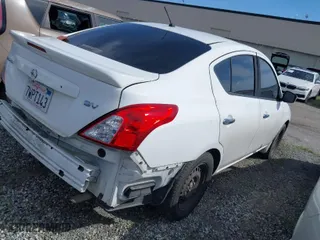2016 Nissan Versa SV with VIN 3N1CN7AP0GL908760, listed as a IAAI auction lot 41866244 with 134,165 mi miles. Bid and sale history available at carsss.com. Image 4.