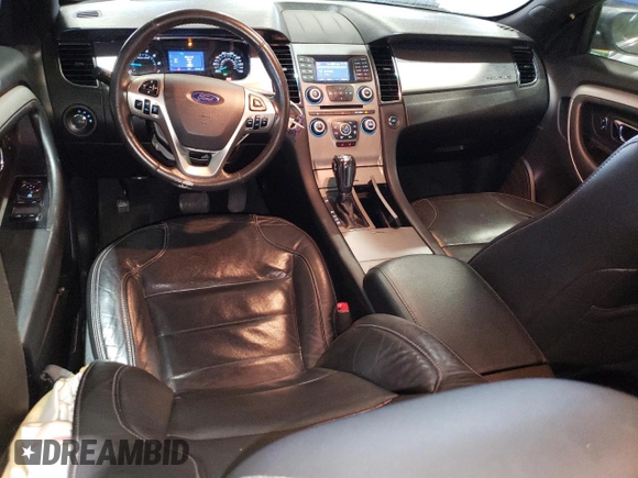 2017 Ford Taurus SEL with VIN 1FAHP2E82HG124014, listed as a Copart auction lot 47630015 with 136,099 mi miles and Salvage Title. Bid and sale history available at DreamBid. Image 8.