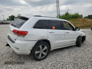2015 Jeep Grand Cherokee Overland z VIN 1C4RJFCG8FC726437, wystawiony jako Copart lot #63671265 z przebiegiem 158 452 mil mil oraz Czysty tytuł • Clean title. Historia ofert i sprzedaży dostępna na DreamBid. Obrazek 3.