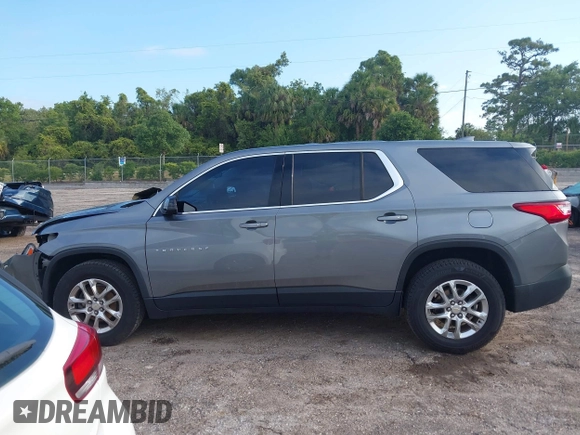 2020 Chevrolet Traverse LS z VIN 1GNERFKW2LJ276394, wystawiony jako IAAI lot #42167725 z przebiegiem 55 975 mil mil oraz . Historia ofert i sprzedaży dostępna na DreamBid. Obrazek 14.