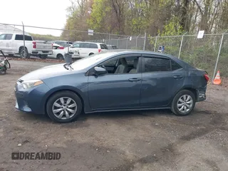 2015 Toyota Corolla L with VIN 2T1BURHE2FC349953, listed as a IAAI auction lot 42001672 with 104,776 mi miles and . Bid and sale history available at DreamBid. Image 14.
