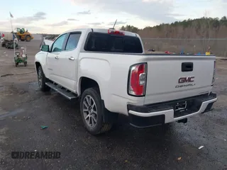 2021 GMC Canyon 4WD Denali with VIN 1GTG6EEN6M1240894, listed as a IAAI auction lot 41387786 with 73,323 mi miles. Bid and sale history available at carsss.com. Image 3.