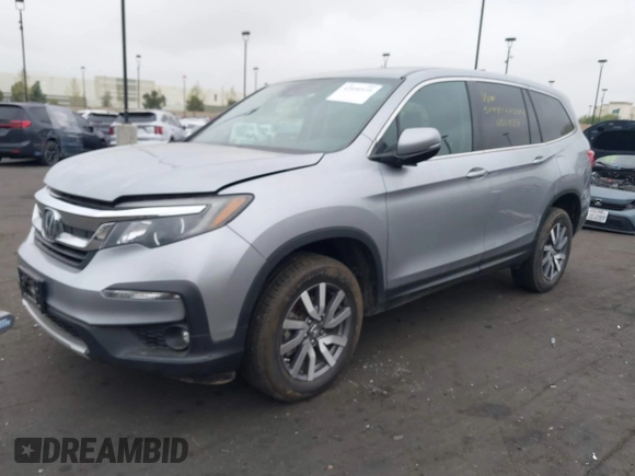 2019 Honda Pilot EX-L with VIN 5FNYF6H54KB055687, listed as a IAAI auction lot 42050539 with 50,989 mi miles and . Bid and sale history available at carsss.com. Image 2.