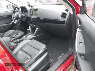 2015 Mazda CX-5 Grand Touring with VIN JM3KE4DY0F0479392, listed as a IAAI auction lot 41659415 with 141,403 mi miles. Bid and sale history available at carsss.com. Image 5.