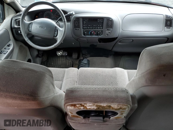 2002 Ford F-150 XL with VIN 1FTRX18L12NA76744, listed as a Copart auction lot 57335455 with Not provided miles and Clean title. Bid and sale history available at DreamBid. Image 8.