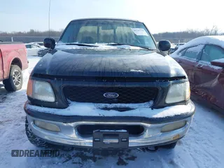1997 Ford F-150 XL with VIN 1FTDF08W5VKD47103, listed as a IAAI auction lot 41345739 with 209,732 mi miles. Bid and sale history available at carsss.com. Image 12.