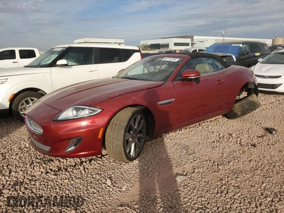 2013 Jaguar XK with VIN SAJWA4GB0DLB50530, listed as a Copart auction lot 82715724 with 24,634 mi miles and Salvage Title. Bid and sale history available at carsss.com. Image 1.