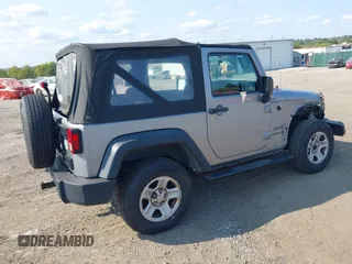 2013 Jeep Wrangler Sport with VIN 1C4AJWAG5DL639365, listed as a IAAI auction lot 40342277 with 117,109 mi miles and . Bid and sale history available at DreamBid. Image 4.
