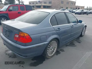 2001 BMW 3 Series 330i with VIN WBAAV53471JR79008, listed as a IAAI auction lot 42165063 with 215,409 mi miles and . Bid and sale history available at carsss.com. Image 4.
