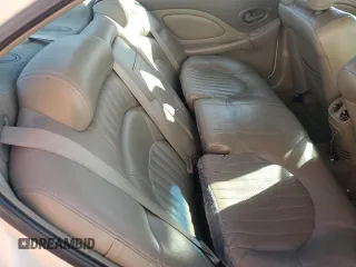 2002 Pontiac Bonneville SLE z VIN 1G2HY54K824158784, wystawiony jako Copart lot #74749224 z przebiegiem Nie podano mil oraz Szkoda całkowita • Salvage title. Historia ofert i sprzedaży dostępna na DreamBid. Obrazek 10.