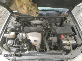 2000 Toyota Camry CE with VIN JT2BG22K6Y0471945, listed as a Copart auction lot 48932715 with Not Provided miles and Salvage Title. Bid and sale history available at DreamBid. Image 12.