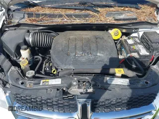 2019 Dodge Grand Caravan SE with VIN 2C4RDGBG8KR646829, listed as a IAAI auction lot 42136947 with 73,015 mi miles and . Bid and sale history available at DreamBid. Image 10.