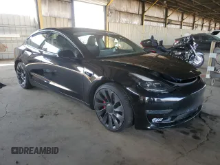 2021 Tesla Model 3 Performance with VIN 5YJ3E1EC0MF060360, listed as a Copart auction lot 43315195 with 28,726 mi miles and Salvage Title. Bid and sale history available at DreamBid. Image 4.