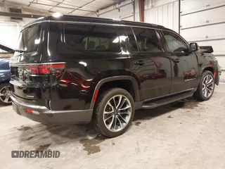 2022 Jeep Wagoneer Series II with VIN 1C4SJVBT5NS127476, listed as a IAAI auction lot 41807474 with 48,703 mi miles and . Bid and sale history available at DreamBid. Image 4.
