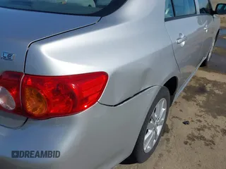 2010 Toyota Corolla with VIN 1NXBU4EE5AZ260859, listed as a IAAI auction lot 41647848 with 129,074 mi miles and . Bid and sale history available at DreamBid. Image 6.