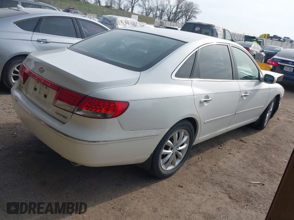 2007 Hyundai Azera SE with VIN KMHFC46F07A139369, listed as a IAAI auction lot 41999327 with 145,827 mi miles and . Bid and sale history available at DreamBid. Image 4.