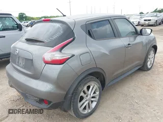 2015 Nissan Juke S with VIN JN8AF5MR8FT512769, listed as a IAAI auction lot 42102306 with 74,952 mi miles. Bid and sale history available at carsss.com. Image 4.